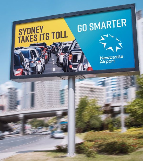 Newcastle Airport billboard collateral on highway roadside